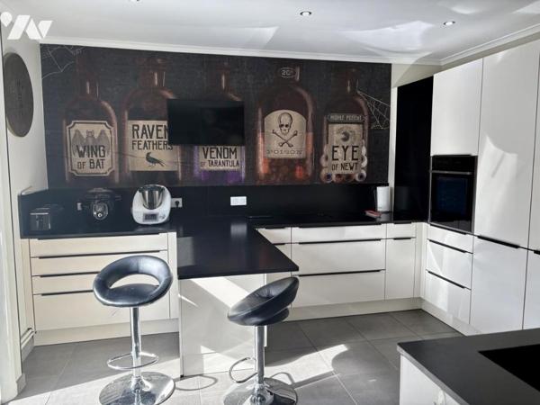 Maison à usage d'habitation 