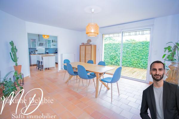 Superbe maison contemporaine de plain-pied avec garage et jardin
