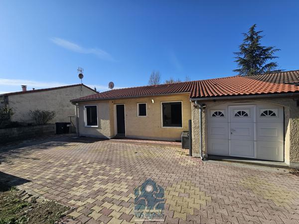 Maison de plain pied avec sous-sol aménagé, terrasse, garage et parking