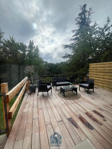 Maison de plain pied avec sous-sol aménagé, terrasse, garage et parking