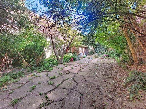 T2  lumineux avec jardin partagé