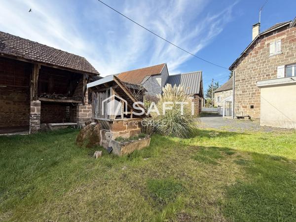 Ensemble immobilier rénové avec dépendances et terrain.