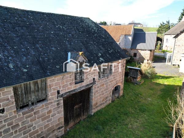 Ensemble immobilier rénové avec dépendances et terrain.