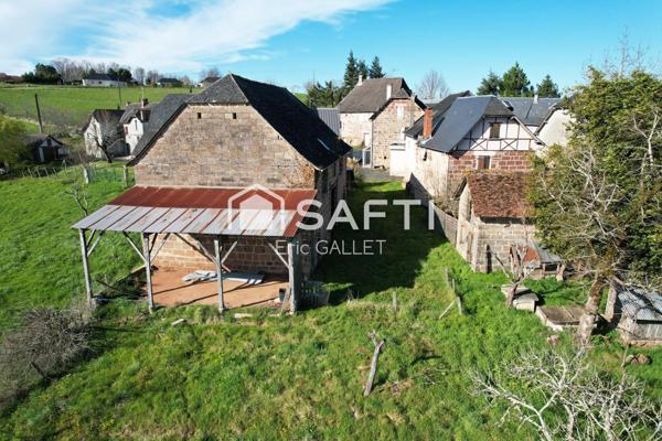 Ensemble immobilier rénové avec dépendances et terrain.