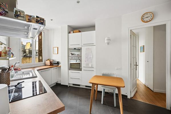 RUE TOCQUEVILLE - Appartement de 84m2 - 2 chambres - Charme de l'ancien