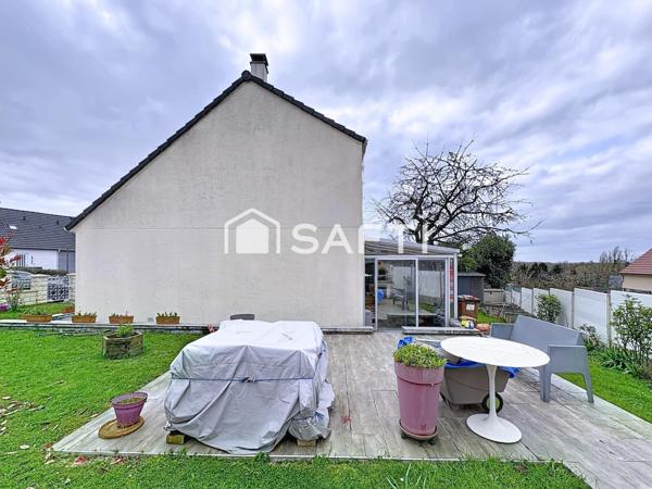 Maison familiale avec jardin, garage et sous-sol