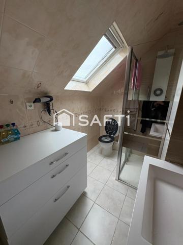 Maison familiale avec jardin, garage et sous-sol