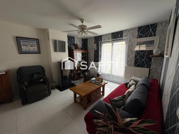 Maison familiale avec jardin, garage et sous-sol