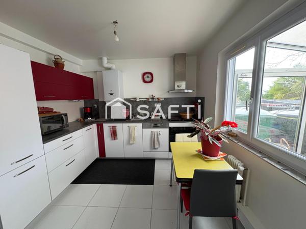 Maison familiale avec jardin, garage et sous-sol