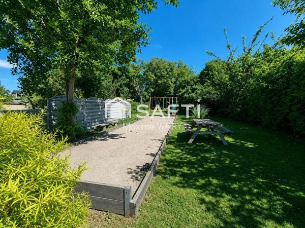 Maison semi plain-pied de 4 chambres – Magnifique jardin et garage