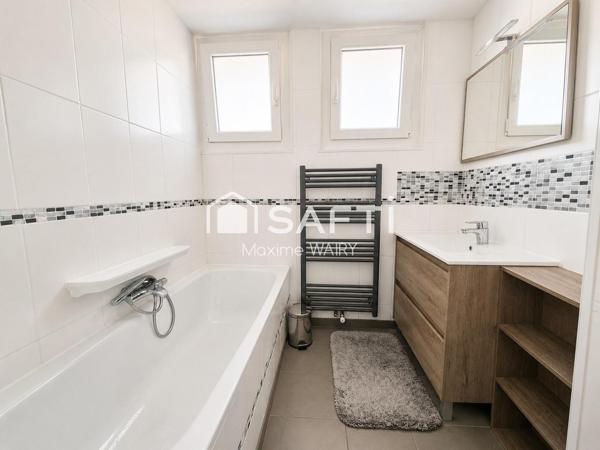 Maison semi plain-pied de 4 chambres – Magnifique jardin et garage