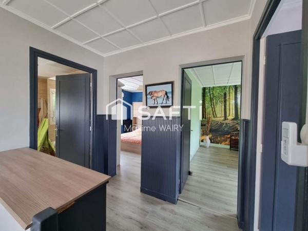 Maison semi plain-pied de 4 chambres – Magnifique jardin et garage