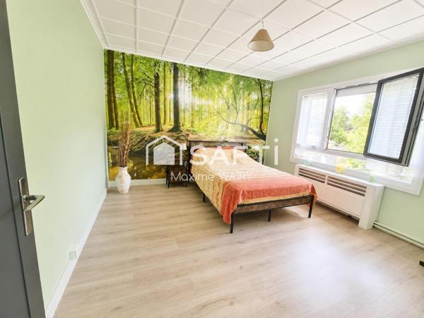 Maison semi plain-pied de 4 chambres – Magnifique jardin et garage