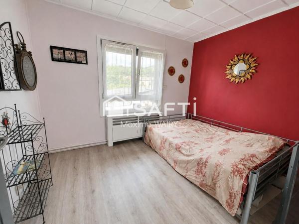 Maison semi plain-pied de 4 chambres – Magnifique jardin et garage