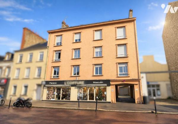 IMMEUBLE LOUE - APPARTEMENTS + LOCAL COMMERCIAL + GARAGES