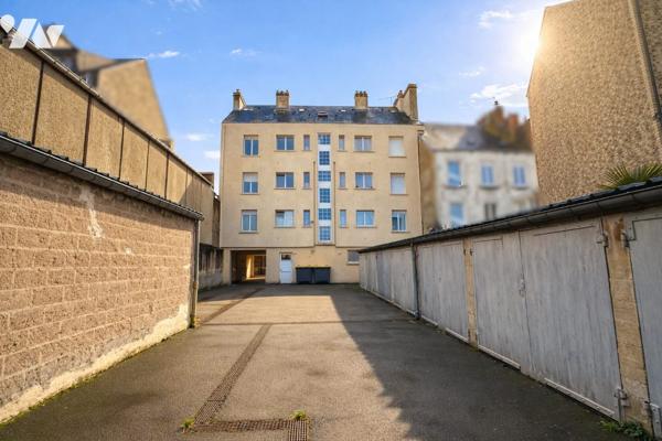 IMMEUBLE LOUE - APPARTEMENTS + LOCAL COMMERCIAL + GARAGES