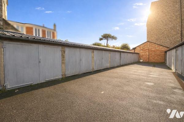 IMMEUBLE LOUE - APPARTEMENTS + LOCAL COMMERCIAL + GARAGES