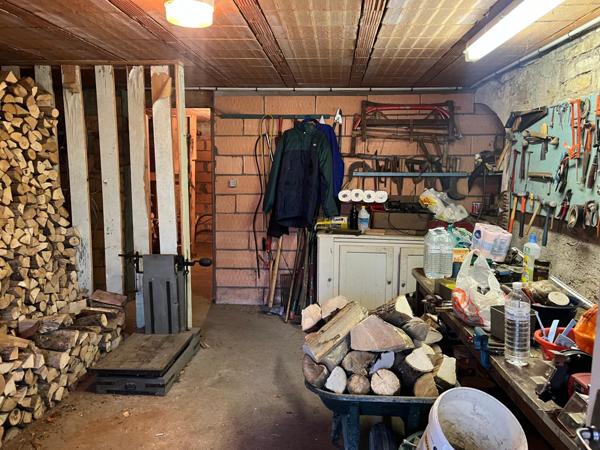 Maison de 112 m2, 3 chambres, garage et terrain.