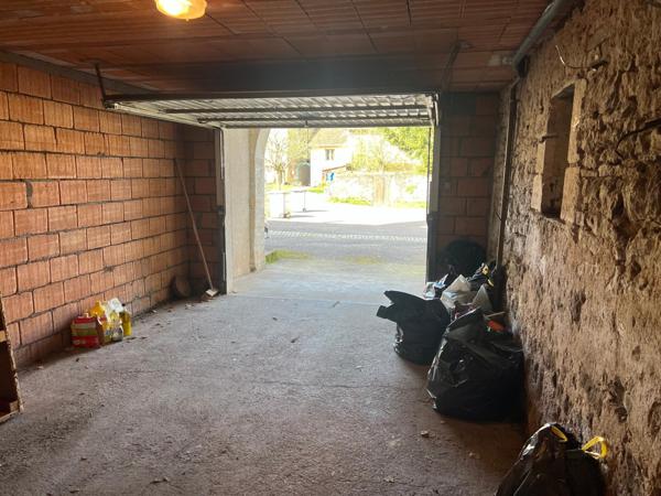 Maison de 112 m2, 3 chambres, garage et terrain.