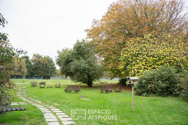 Demeure bretonne avec parc arboré, piscine couverte et dépendances rénovées