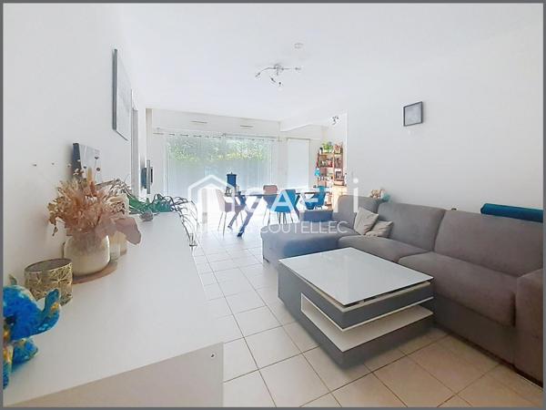 Appartement T2 avec terrasse, parking et garage fermé