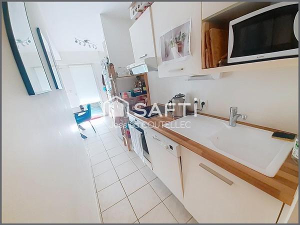 Appartement T2 avec terrasse, parking et garage fermé