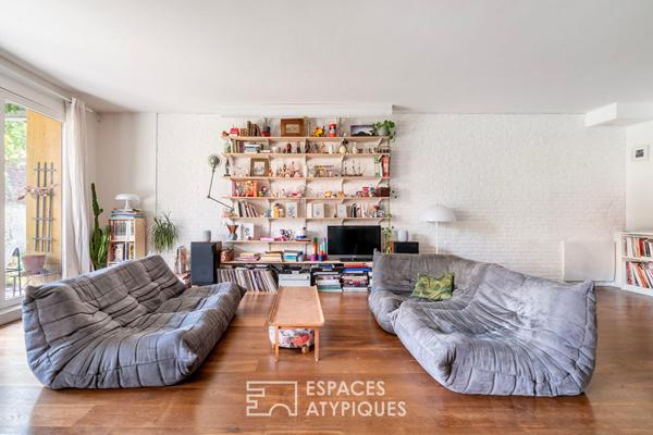 Loft sur jardin verdoyant dans une ancienne boutonnerie
