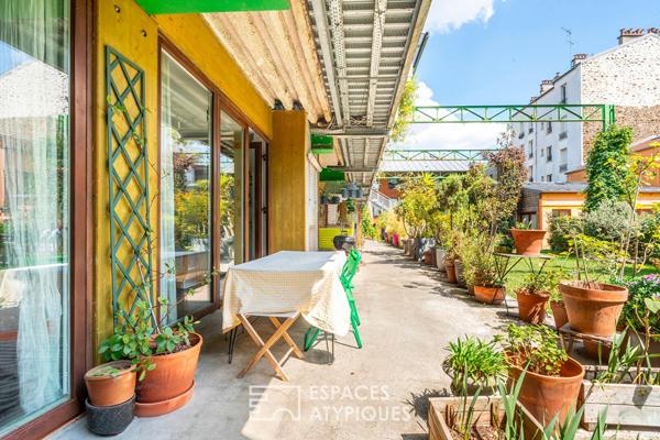 Loft sur jardin verdoyant dans une ancienne boutonnerie