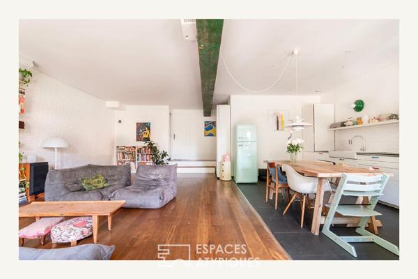 Loft sur jardin verdoyant dans une ancienne boutonnerie