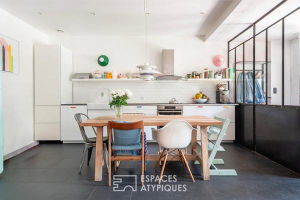 Loft sur jardin verdoyant dans une ancienne boutonnerie