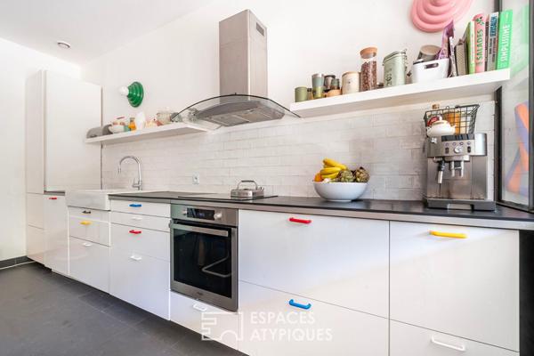 Loft sur jardin verdoyant dans une ancienne boutonnerie