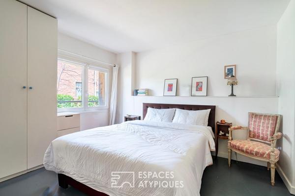 Loft sur jardin verdoyant dans une ancienne boutonnerie