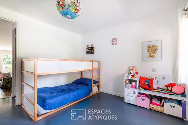 Loft sur jardin verdoyant dans une ancienne boutonnerie