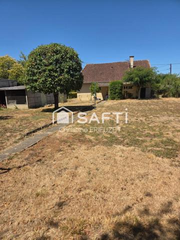 Plain-pied avec jardin et deux garages