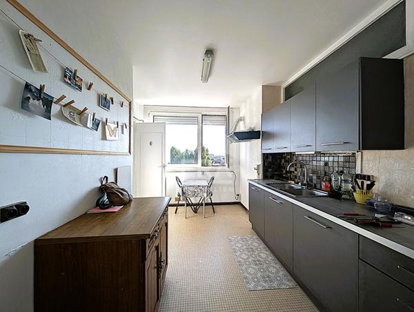 Appartement T3 Ronchin 105 m², 2 chambres, balcon, garage + caves