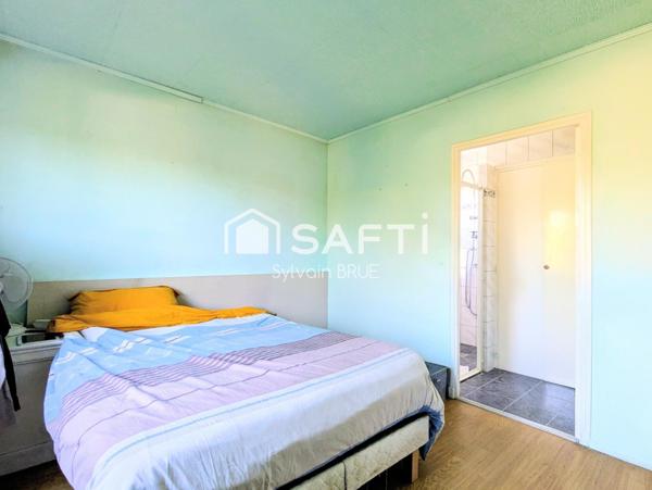 Maison avec sous-sol complet – 4 chambres – Équipements récents