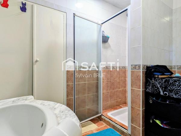 Maison avec sous-sol complet – 4 chambres – Équipements récents