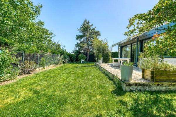 Christophe Michaudelle – CAPIFRANCE - vous propose à JUILLY : maison - 7 pièces - 175 m² - 5 chambres - grandes pièces de vie avec véranda - 2 pièces d'eau - dressing - buanderie - garage et stationne