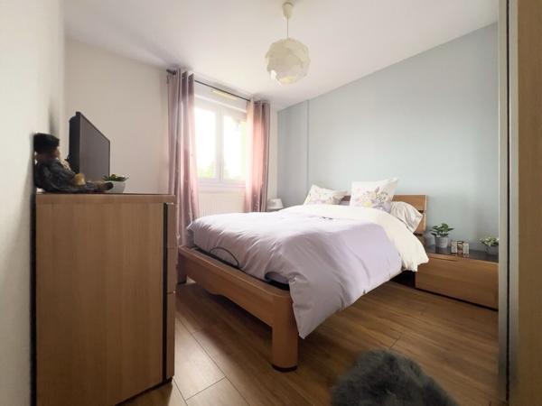 Appartement 3 pièces avec balcon, grand garage et cave