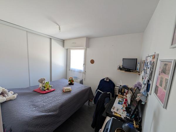 Appartement T2 avec locataire en place - Résidence sécurisée avec ascenseur, parking et cave
