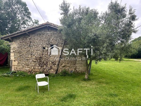 Terrain de 3109m2 avec projet de construction pour un bâtiment de 100m2 situé au coeur d'un environnement agricole BIO.