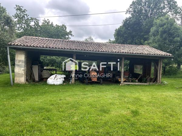 Terrain de 3109m2 avec projet de construction pour un bâtiment de 100m2 situé au coeur d'un environnement agricole BIO.