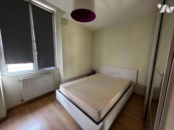 DOLE (39) centre-ville, un appartement meublé au 1er étage avec terrasse de 26 m²