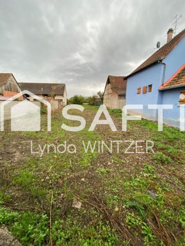 Hors lotissement : Beau terrain de 10 ares au calme et face aux champs.