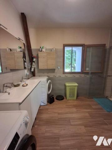 Maison T5 avec garage et véranda sur 9000m2 de jardin dans écrin de verdure