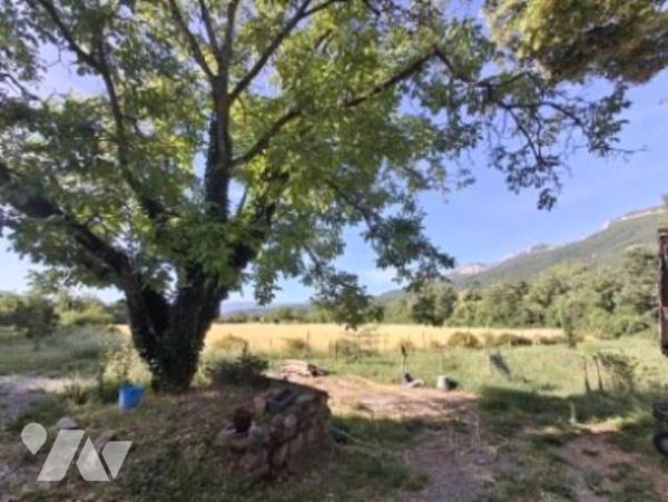 Maison T5 avec garage et véranda sur 9000m2 de jardin dans écrin de verdure