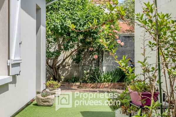 Maison confortable avec petit jardin