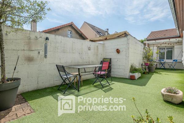 Maison confortable avec petit jardin