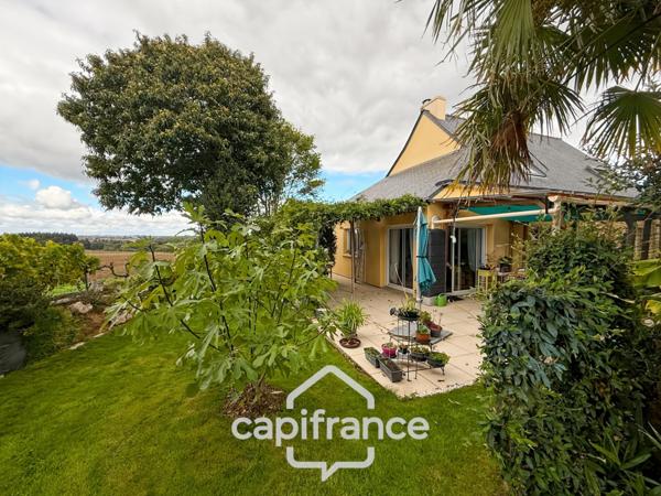 Spacieuse maison familiale en brique – 4 chambres, terrasse de 60 m² avec pergola – Proximité immédiate du centre de Noyal-Pontivy
