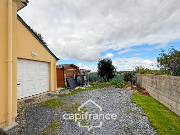 Spacieuse maison familiale en brique – 4 chambres, terrasse de 60 m² avec pergola – Proximité immédiate du centre de Noyal-Pontivy